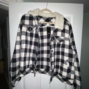 Plaid torrid trucker jacket with fur collar.